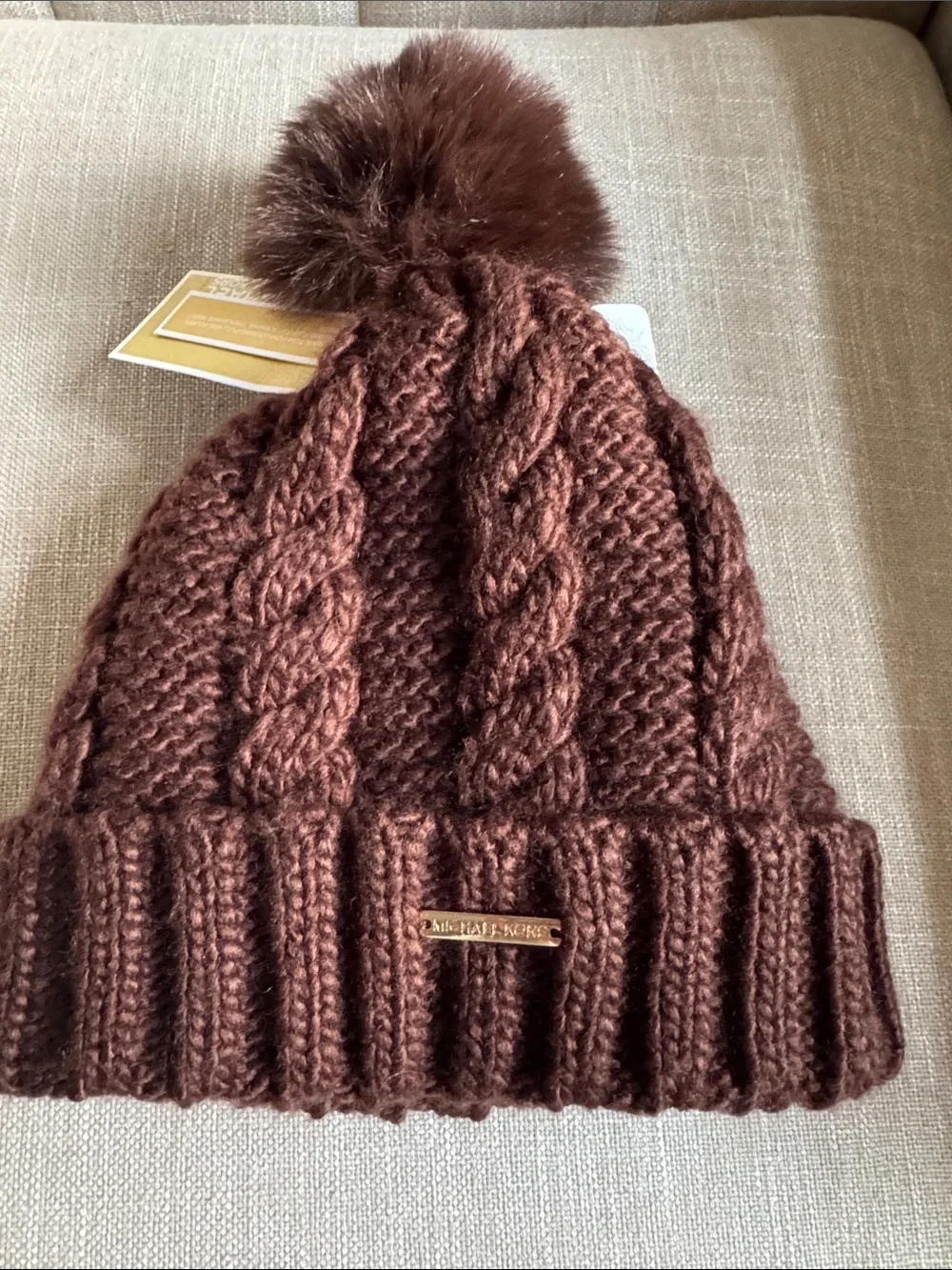 Michael Kors Knit Pom Beanie in Plum with Gold Logo